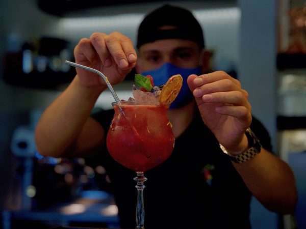 Barman preparing an Italian cocktail in Bellagio