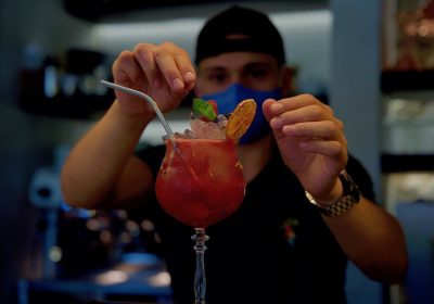 Barman preparing an Italian cocktail in Bellagio